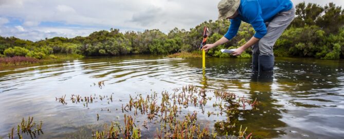 Measuring water levels in a watershed.