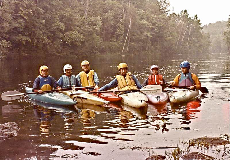 Flotilla on of Kayakers on the St. Francis River. 